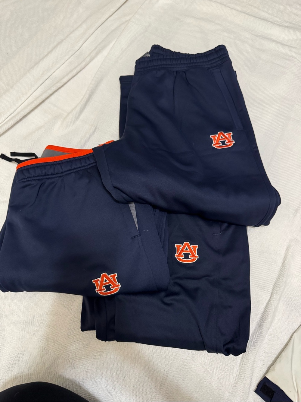 Lot of Under Armour Navy Joggers with Orange Trim